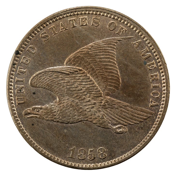 Obverse of an 1858 Flying Eagle cent: eagle in flight, UNITED STATES OF AMERICA, date below